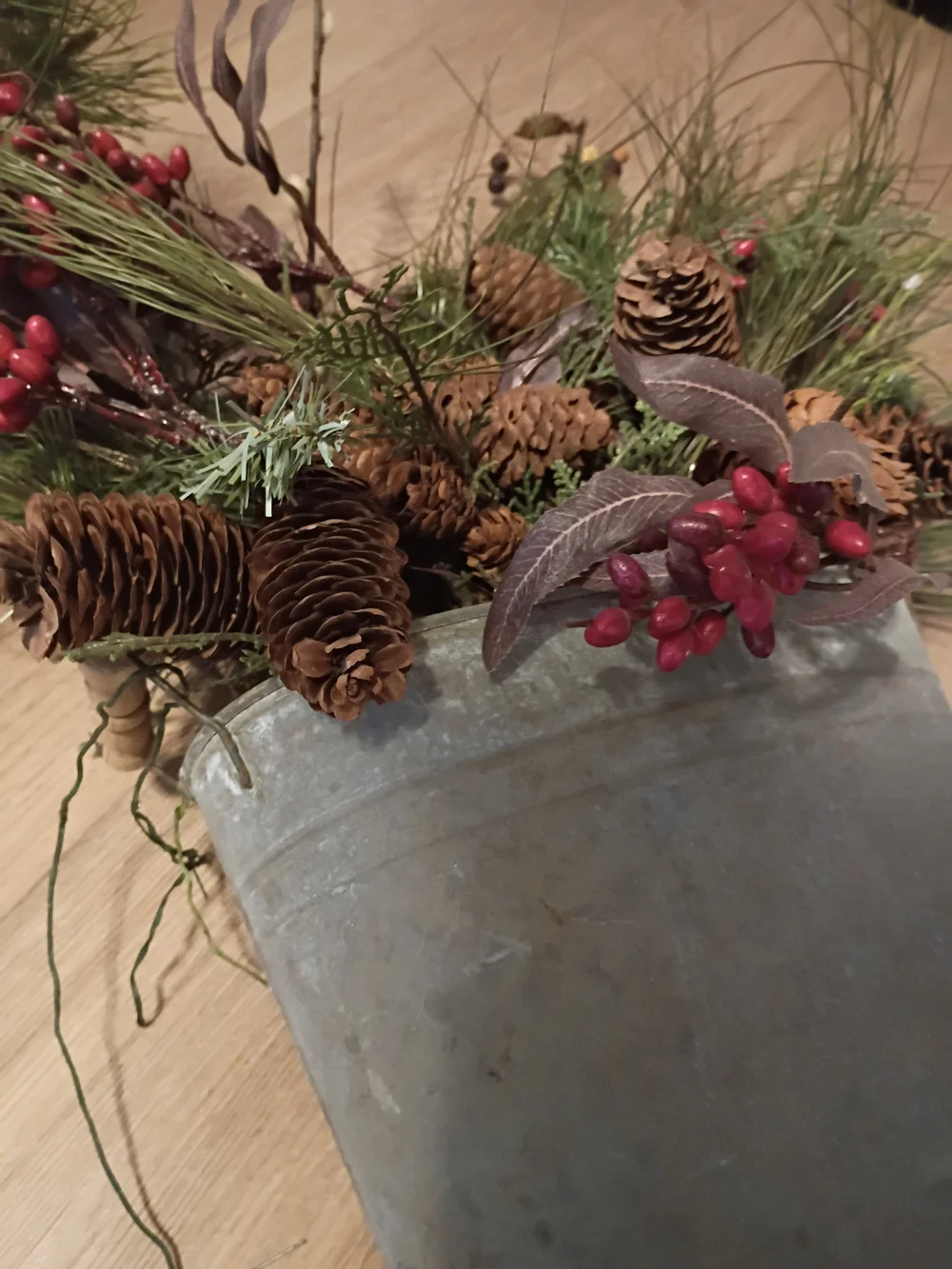 Holiday Pine & Berry Arrangement in Rustic Metal Vase